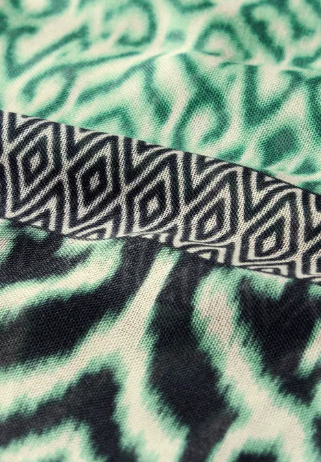 Gemusterter Loop Schal tendril green