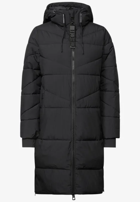Steppmantel mit Kapuze und Reißverschluss Black Schwarzer, langer, wattierter Wintermantel mit Kapuze, durchgehendem Reißverschluss und seitlichen Taschen.