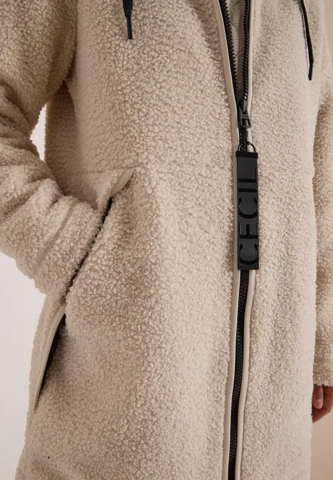 Strukturmix Teddy-Mantel mit Kapuze teddy vanilla white Close-up eines beigen Teddy-Fleece-Mantels mit Reißverschluss und seitlichen Taschen.