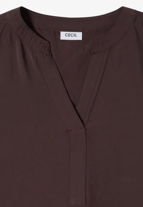 Chemisier femme marron foncé CECIL, col en V discret et coupe épurée.