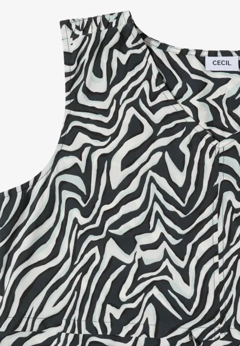 Mouwloze top met zwart-wit zebraprint, casual en modieus.