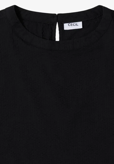 Zwart structuur-topje voor dames met ronde hals en 'CECIL'-label.