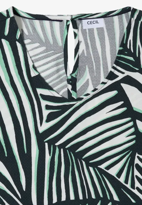 Mouweloze top met zwart-wit zebraprint en groene palmbladeren