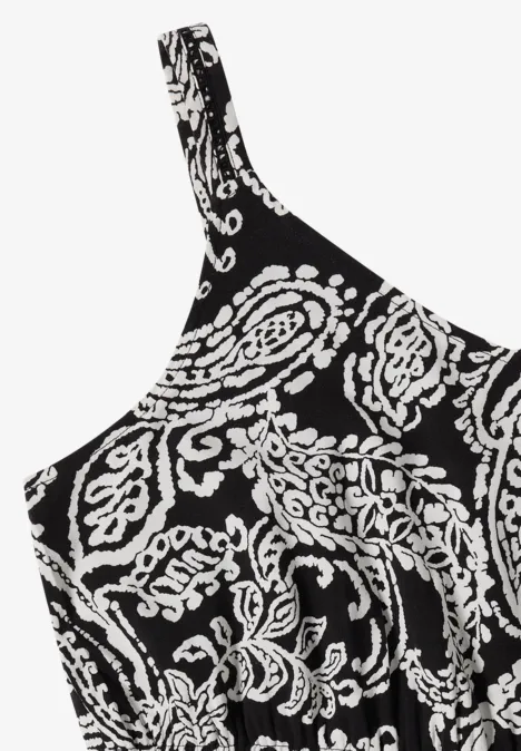 Schwarzes Top mit asymmetrischem Schnitt und weißem Paisley-Muster.