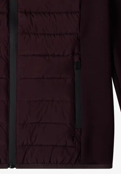 Veste bordeaux à face avant matelassée, poche zippée et manches ainsi que côtés en tissu doux