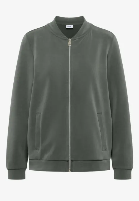 Olivgrüne Samtbomberjacke mit Reißverschluss und seitlichen Taschen.