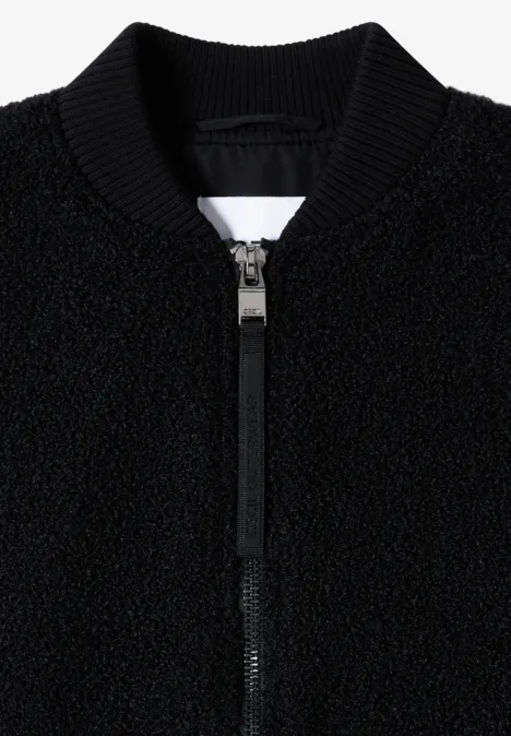 Schwarze Jacke mit Reißverschluss und strukturierter Teddy-Optik