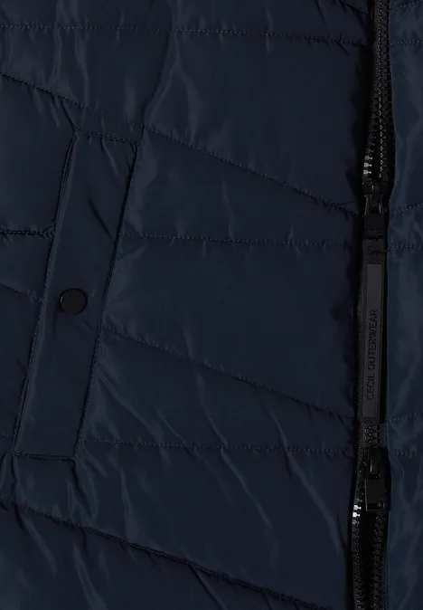 Lange Steppweste mit Stehkragen dark navy blue Dunkelblaue gesteppte Jacke mit Reißverschluss und Knopftasche.