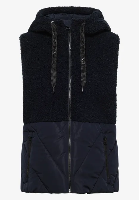 Teddy-Weste mit Steppteil und Zipper dark navy blue Ärmellose Weste in Dunkelblau mit Teddy-Fleece-Oberteil, Steppstoff-Unterteil, Kapuze und Reißverschluss.