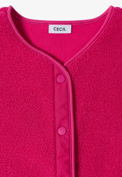Różowy polarowy kardigan z napami i metką CECIL.
