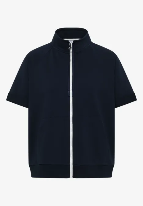 Veste bleu marine à manches courtes, fermeture éclair, col montant et poches latérales