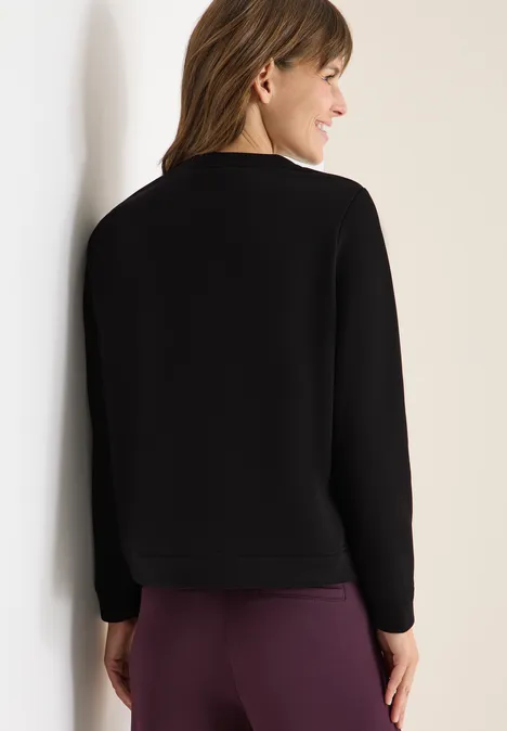 Sweater met borduursel Black Sweater met borduursel Black