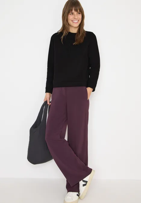 Sweater met borduursel Black Sweater met borduursel Black