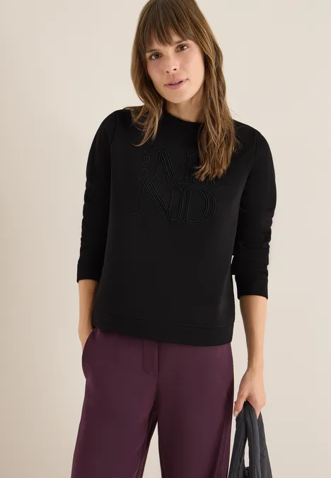 Sweater met borduursel Black Sweater met borduursel Black