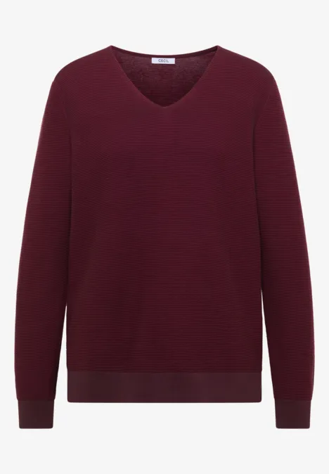 Pull bicolore à col en V berry red Un pull uni à encolure en V bordeaux, manches longues et finitions côtelées discrètes.