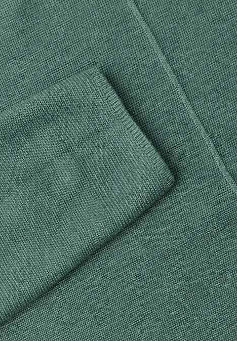 Trui met ronde hals en structuur jewel green melange Ein grüner Strickpullover mit gerippten Bündchen.