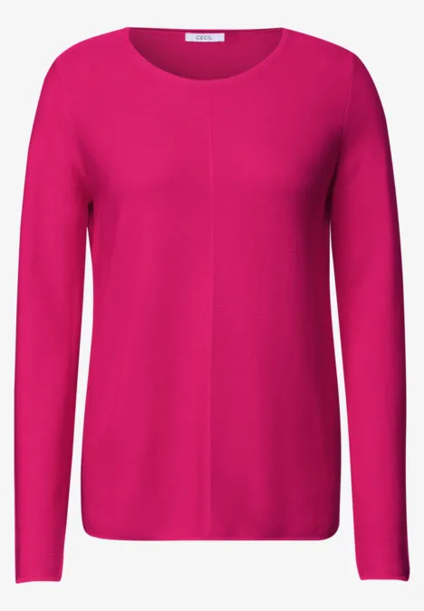 Ein schlichtes, langärmeliges pinkes Shirt mit Rundhalsausschnitt.