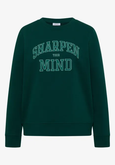 Dunkelgrünes Sweatshirt mit der Aufschrift 'SHARPEN MIND' in Weiß.