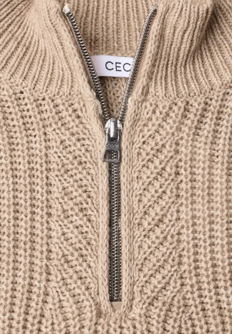 Pull uni à fermeture zip creamy mocha melange Pull beige en maille avec demi-fermeture éclair et col montant