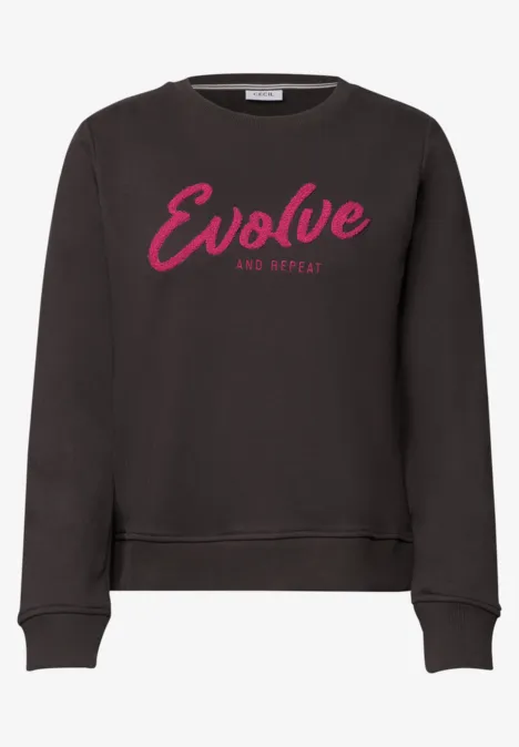 Zwarte trui met roze opschrift 'Evolve and Repeat'