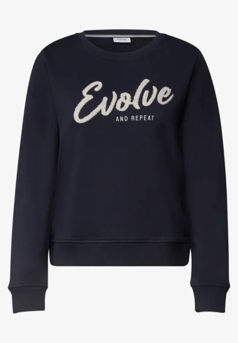Sweatshirt mit Rundhals und Wording urban dark blue Dunkler Sweatpullover mit dem weißen Schriftzug ‘Evolve and Repeat’ auf der Vorderseite.