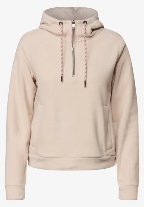 Beiger Kapuzenpullover mit Kängurutasche, Kordelzug und langen Ärmeln – lässiger Stil.