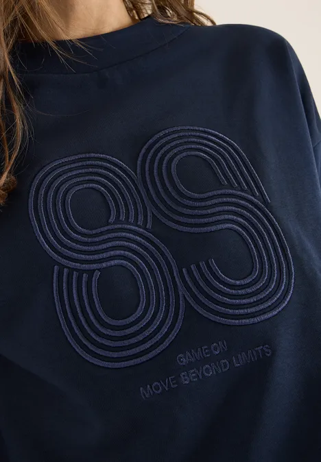 Shirt met borduursel universal blue