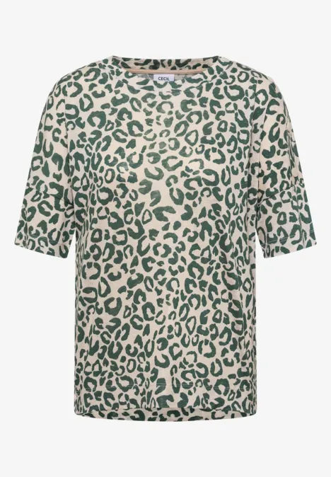 T-shirt beige à motif léopard vert.