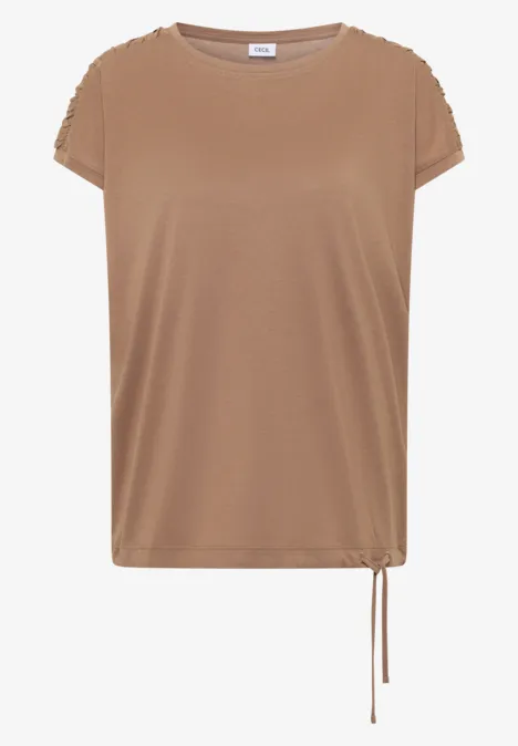 T-shirt beige à manches courtes, col rond et cordon latéral au bas.