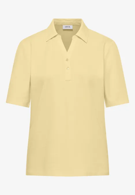 Basis polo met korte mouwen buttermilk yellow Lichtgeel poloshirt met korte mouwen, kraag en knoopsluiting vooraan.
