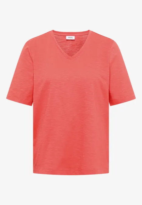 Basic T-Shirt mit Kurzarm und V-Neck shiny coral Schlichtes, korallenrotes Kurzarm-T-Shirt mit V-Ausschnitt.