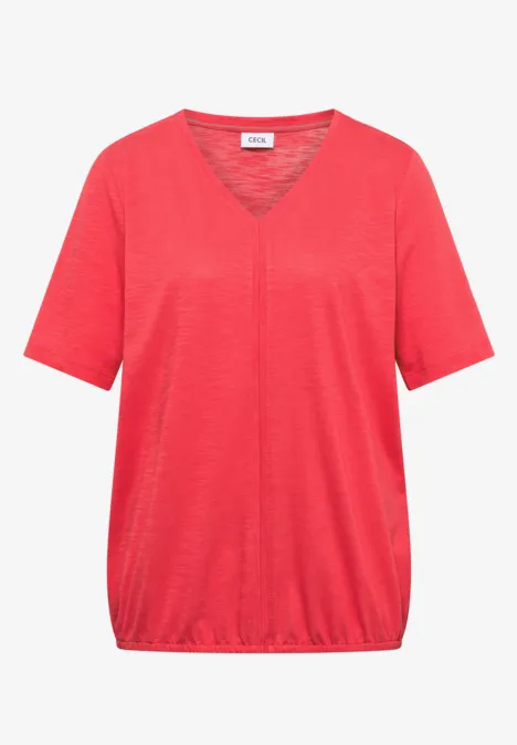 T-shirt femme rouge à col V, manches courtes et ourlet élastiqué discret.