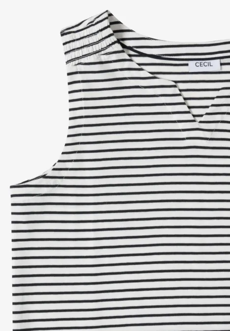 Top sans manches blanc à rayures noires et col en V.