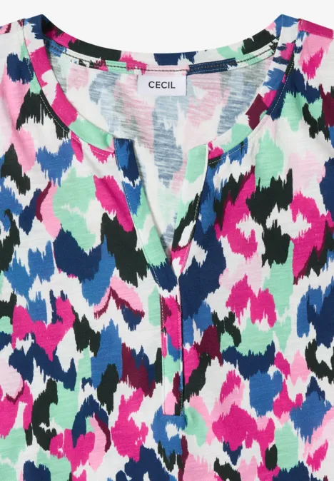 Vrolijk gekleurd damestop met abstract dessin, ronde hals en knoopsluiting