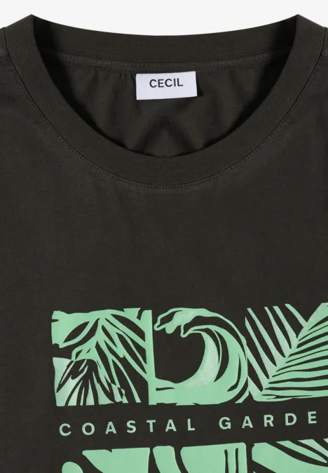Zwart T-shirt met groene tropische bladerenprint, tekst "COASTAL GARDEN" en merklabel "CECIL".