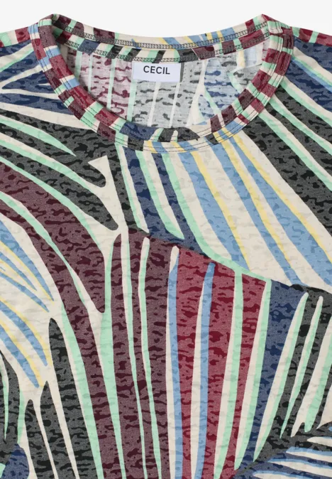 Haut coloré à rayures et motifs abstraits, étiquette 'CECIL' au col.