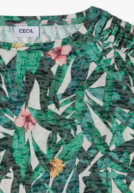 Ärmelloses Top mit grünem Tropenblattmuster und rosa sowie gelben Blumen.