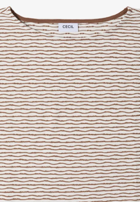T-shirt beige clair à rayures ondulées marron horizontales, encolure ronde, étiquette "CECIL" au col.