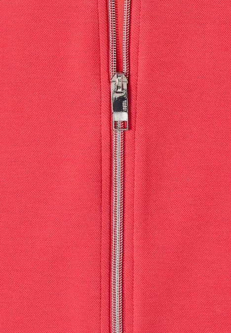 Kapuzenjacke mit seitlichen Tunnelzügen coral Rotes Kleidungsstück aus Stoff mit silbernem Reißverschluss in der Mitte
