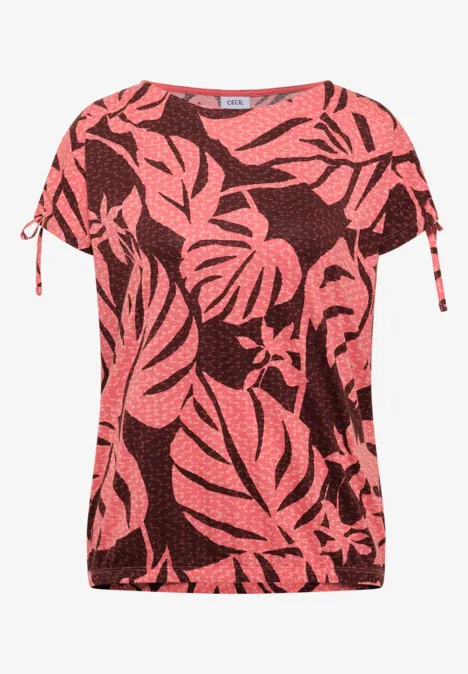 Rode dames-T-shirt met zwarte monstera-bladeren, korte mouwen met sierstrikjes.