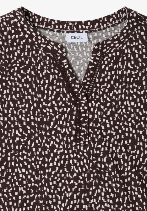 Damenbluse in Braun mit weißem Punkte-Muster, V-Ausschnitt und Knopfleiste, kurzärmelig.
