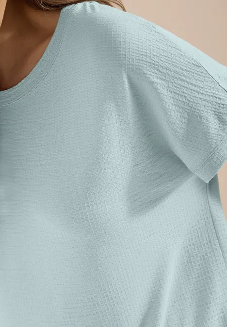 Shirt met ronde hals en structuur crystal mint Close-up van loszittend mintgroen shirt, zonder gezicht zichtbaar