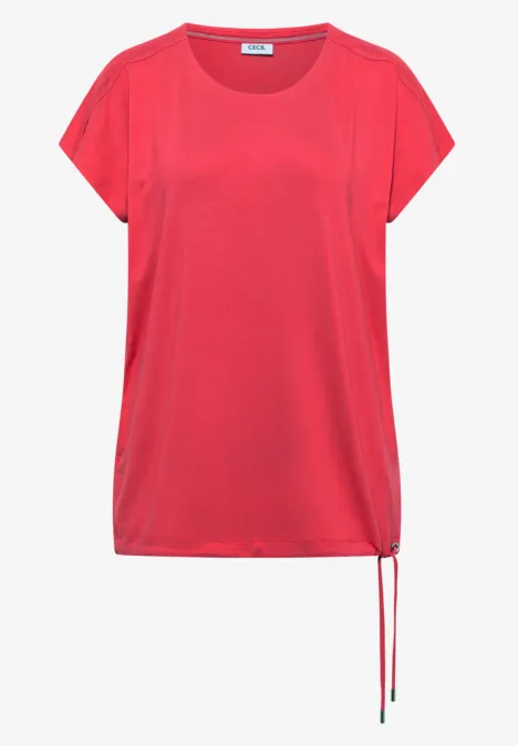 Losvallend rood T-shirt met korte mouwen, ronde hals en zijdige koordsluiting onderaan.