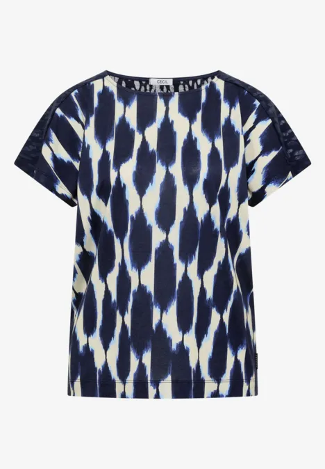 Kurzärmliges T-Shirt mit abstraktem blau-weißem Muster.