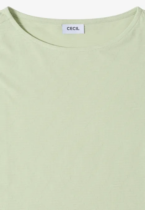 T-shirt vert clair à col rond avec étiquette 'CECIL'.