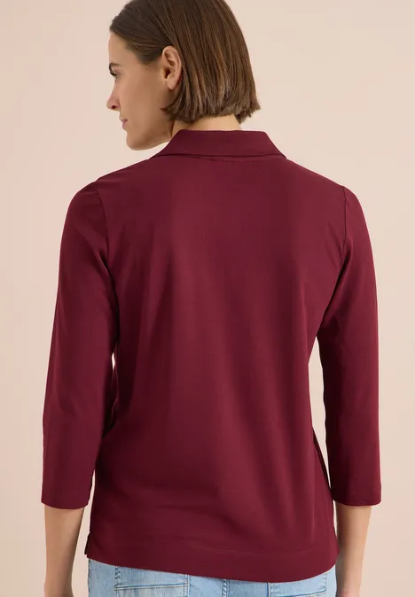3/4-Arm Poloshirt mit Knopfdetail red wine Rückansicht einer Person in bordeauxrotem Oberteil mit Kragen und 3/4-Ärmeln.