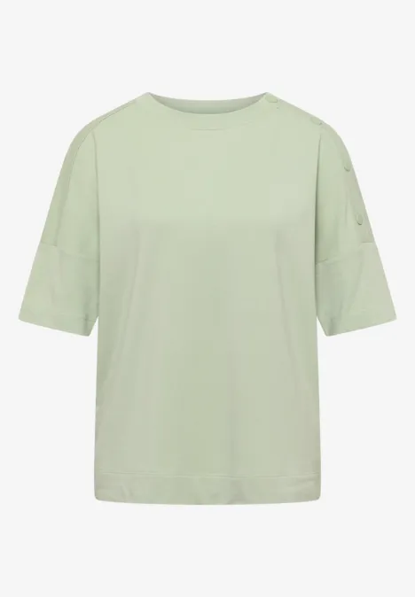 Dropped Shoulder Shirt mit Knöpfen raw matcha lime Lockeres T-Shirt in hellem Pastellgrün, kurze Ärmel, Rundhalsausschnitt, schlicht und modern.