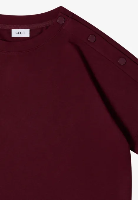 Dropped Shoulder Shirt mit Knöpfen red wine Bordeauxrotes ärmelloses Shirt mit Rundhalsausschnitt und Knopfdetail an der Schulter.