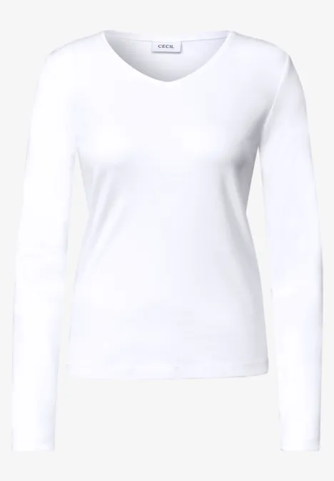 T-shirt à manches longues blanc pour femme avec encolure ronde sur fond blanc.