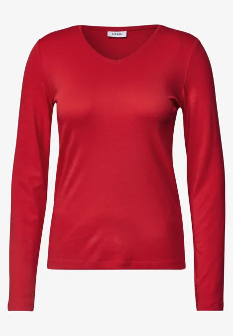 T-shirt femme rouge à manches longues avec encolure en V.